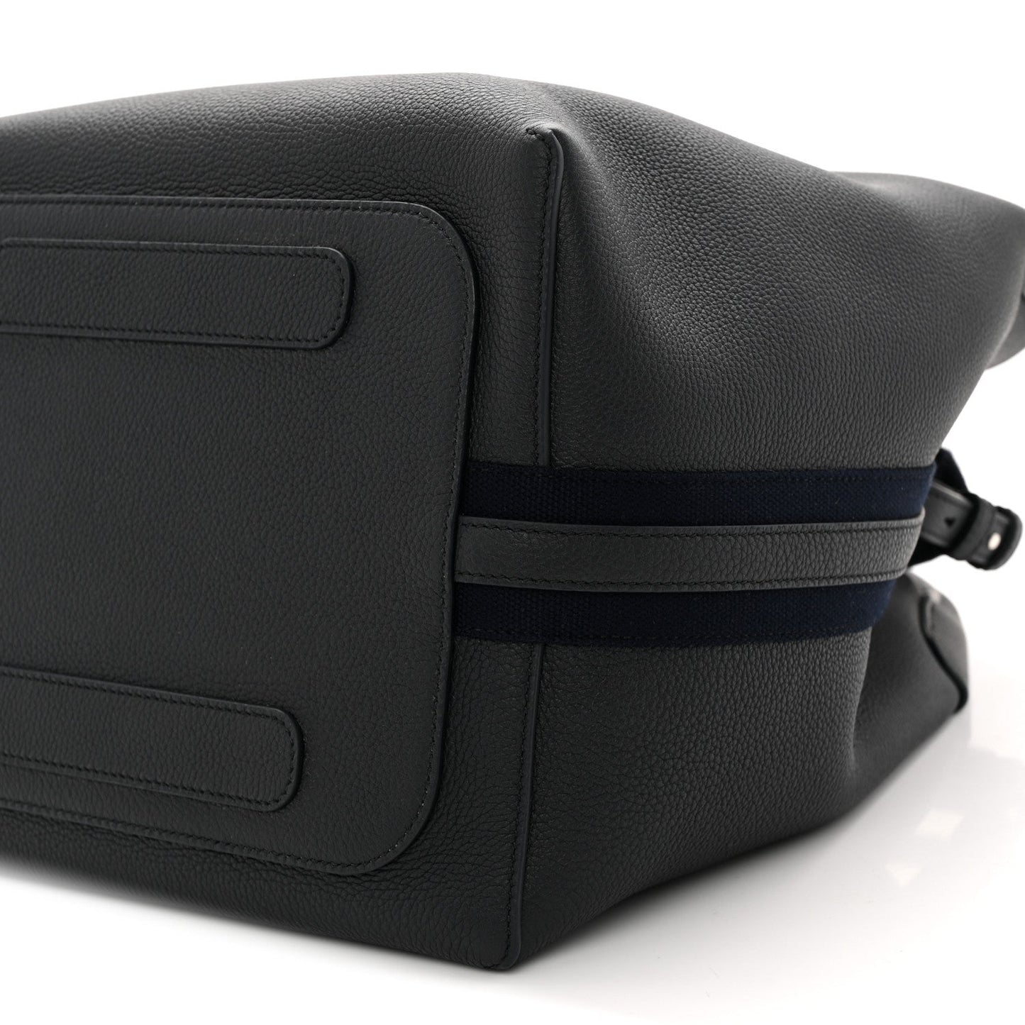Dark navy leather flap panel with seam details and adjustable crossbody strap