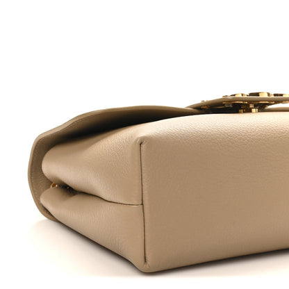 Celine tan calfskin Victoire medium bag corner view with top clasp hardware