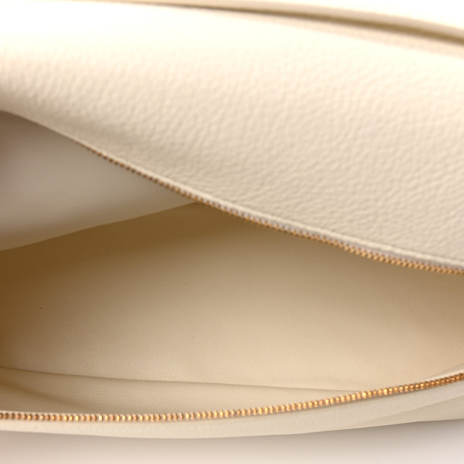 White lambskin bag interior lining with gold-tone zip edge