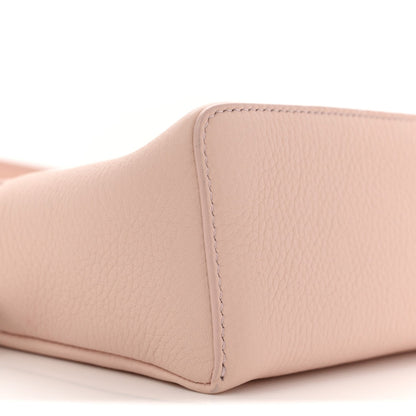 Light pink grained leather corner with stitched edge detail