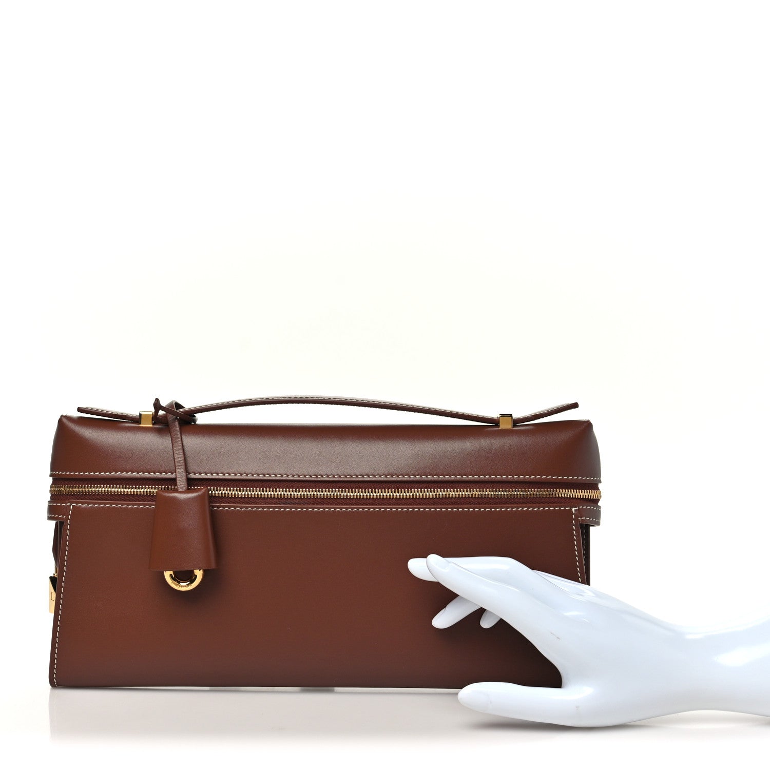Loro Piana smooth calfskin clutch in burnt tan with front flap and gold hardware
