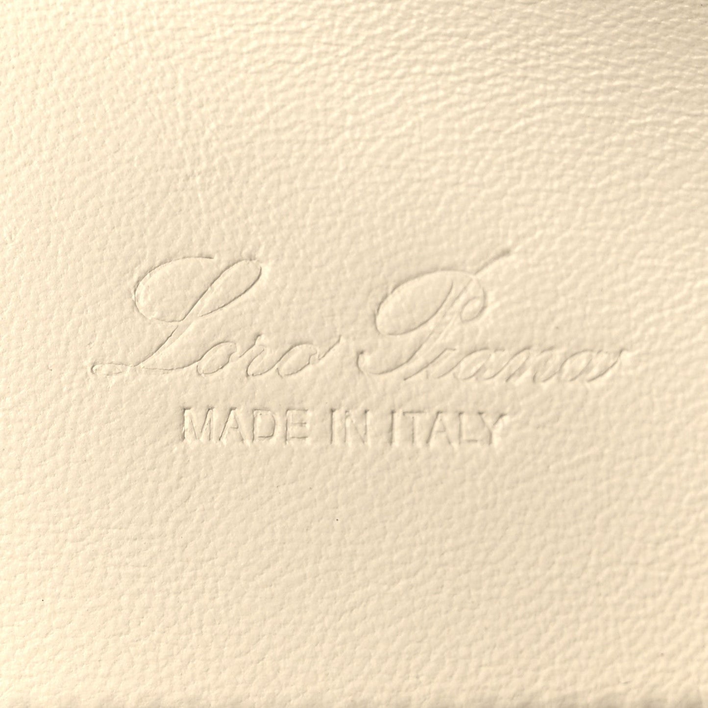 Embossed leather logo text and 'MADE IN ITALY' on grained calfskin