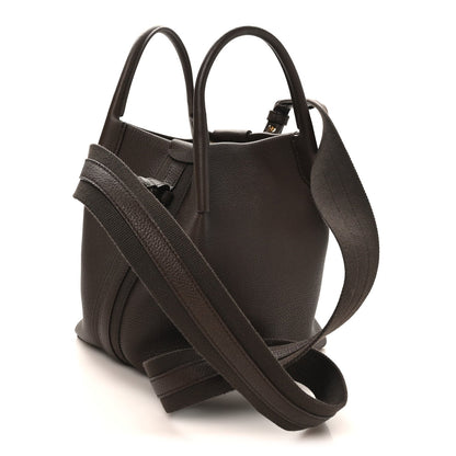 Dark brown grained calfskin small bale bag with top handles and wide shoulder strap