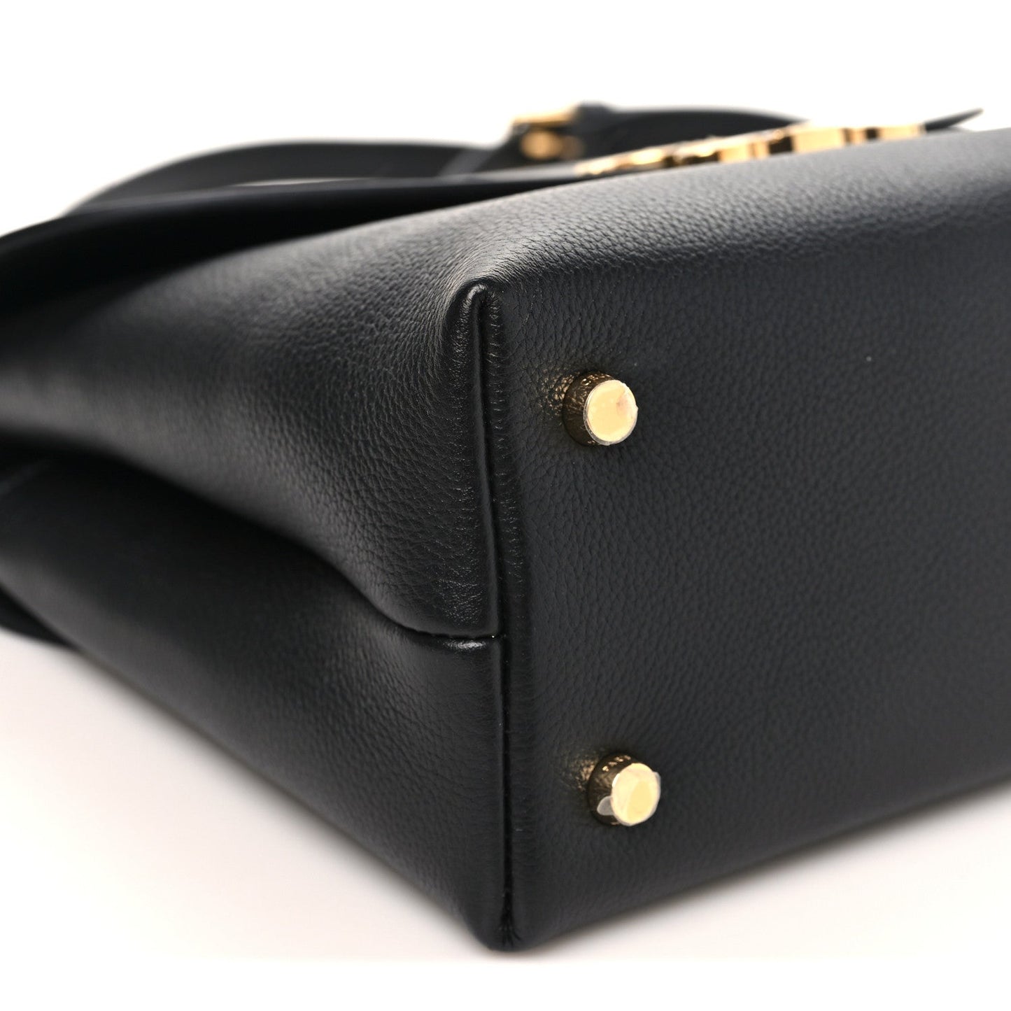 Black Celine medium shoulder bag corner view with gold-tone studs on side