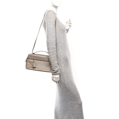 Matte snakeskin handbag in taupe/grey tone with top handle and side view