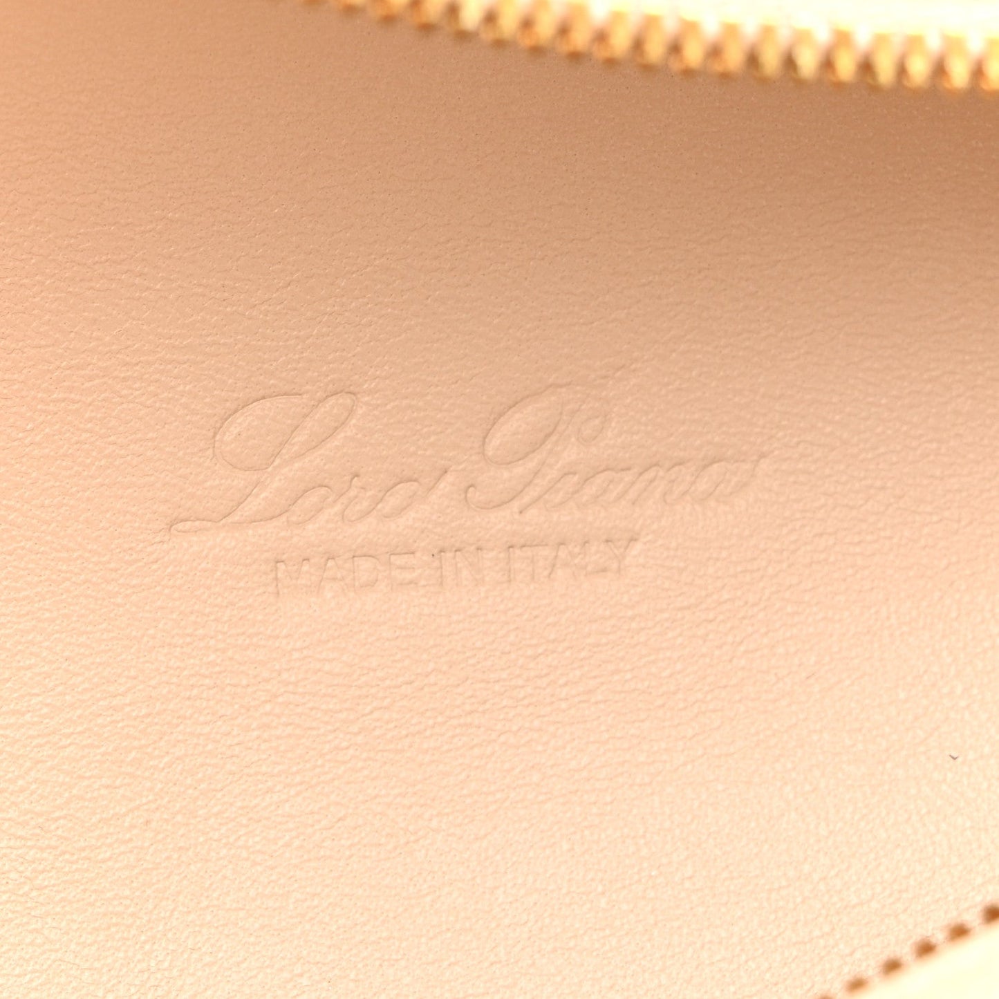 Cream leather pouch with embossed Loro Piana logo