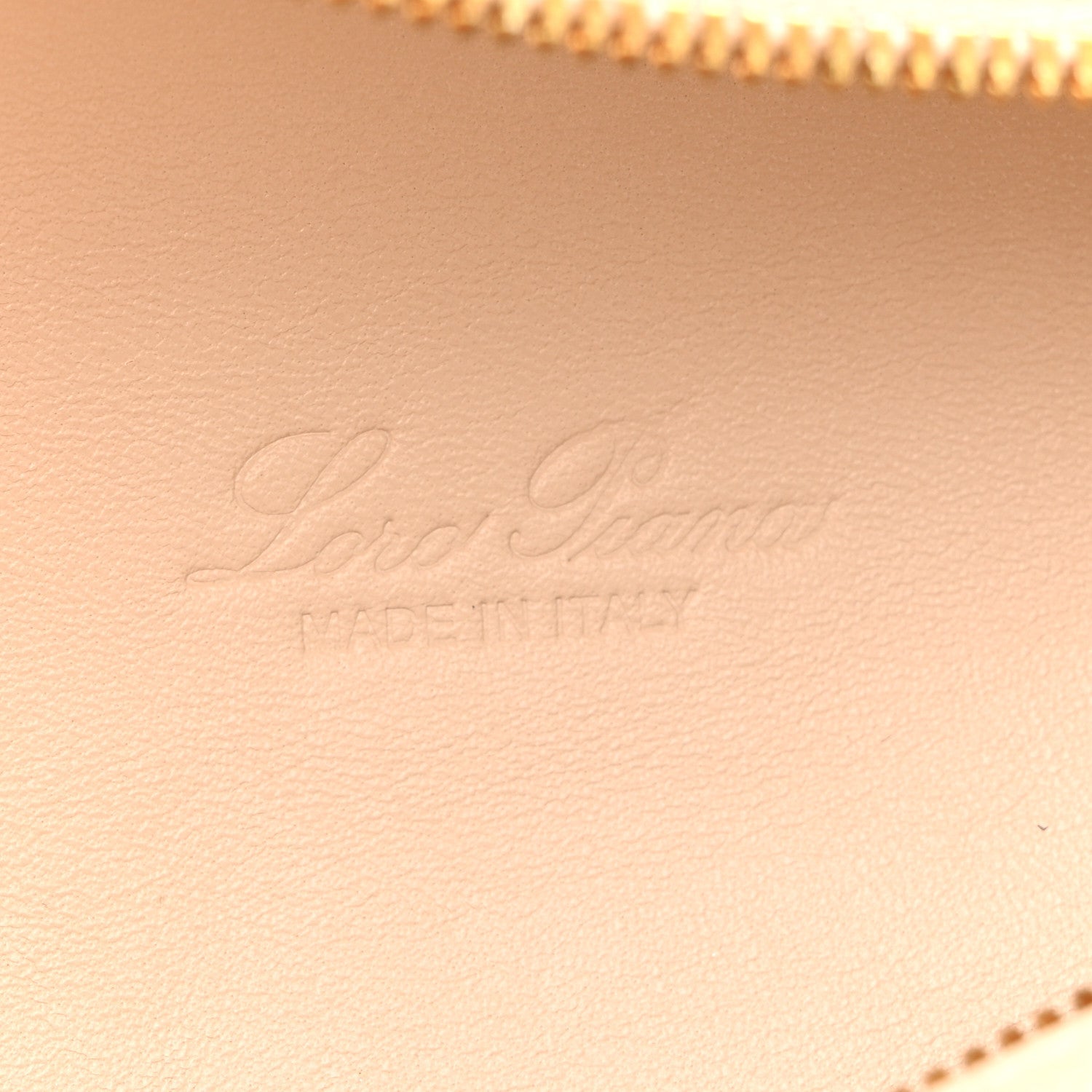 Cream leather pouch with embossed Loro Piana logo
