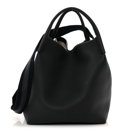 Front view large dark navy tote bag with top handles and curved hobo shape