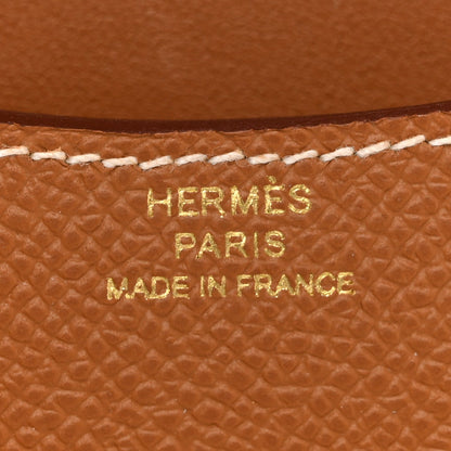 Hermes Paris made in France stamped on brown textured leather wallet.