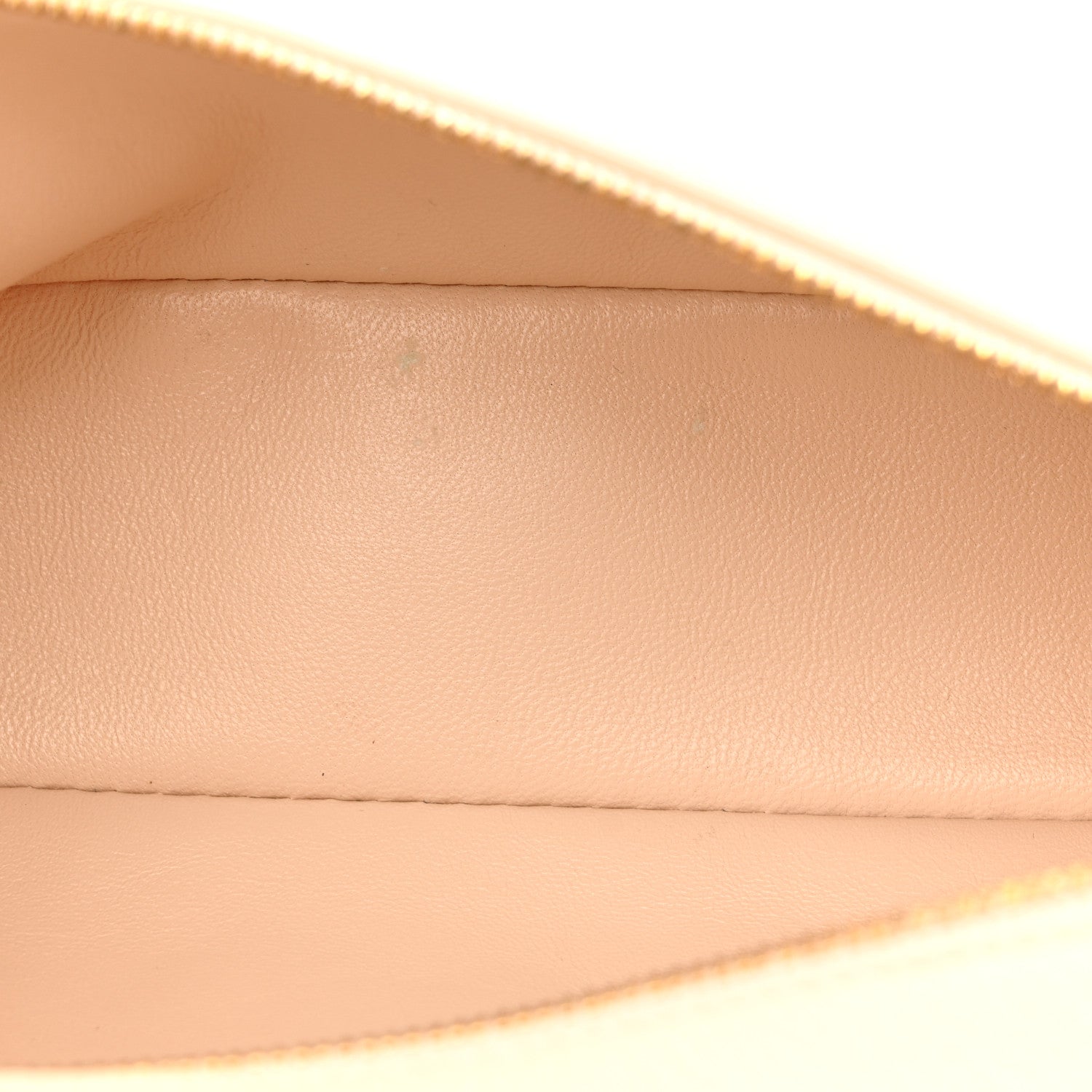 Cream leather pouch interior with smooth lining