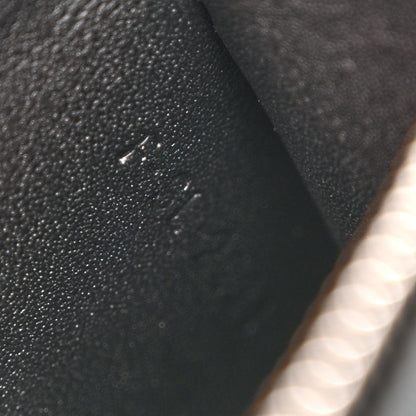 Black leather bag with small visible surface marks on the exterior