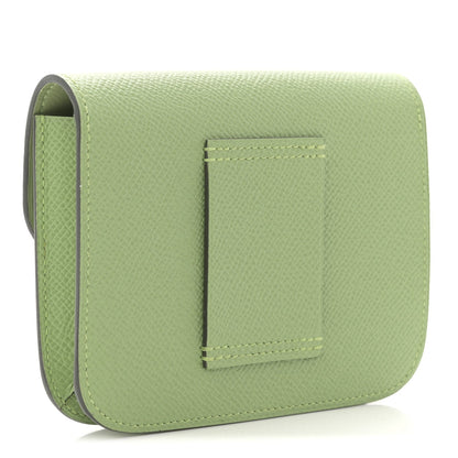 Light green leather slim wallet with card slot pocket under flap
