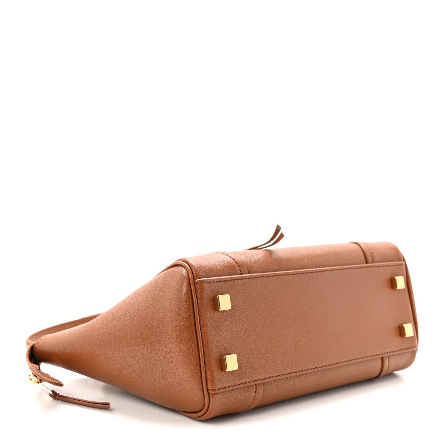 Tan leather mini tote side view with gold-tone corner hardware