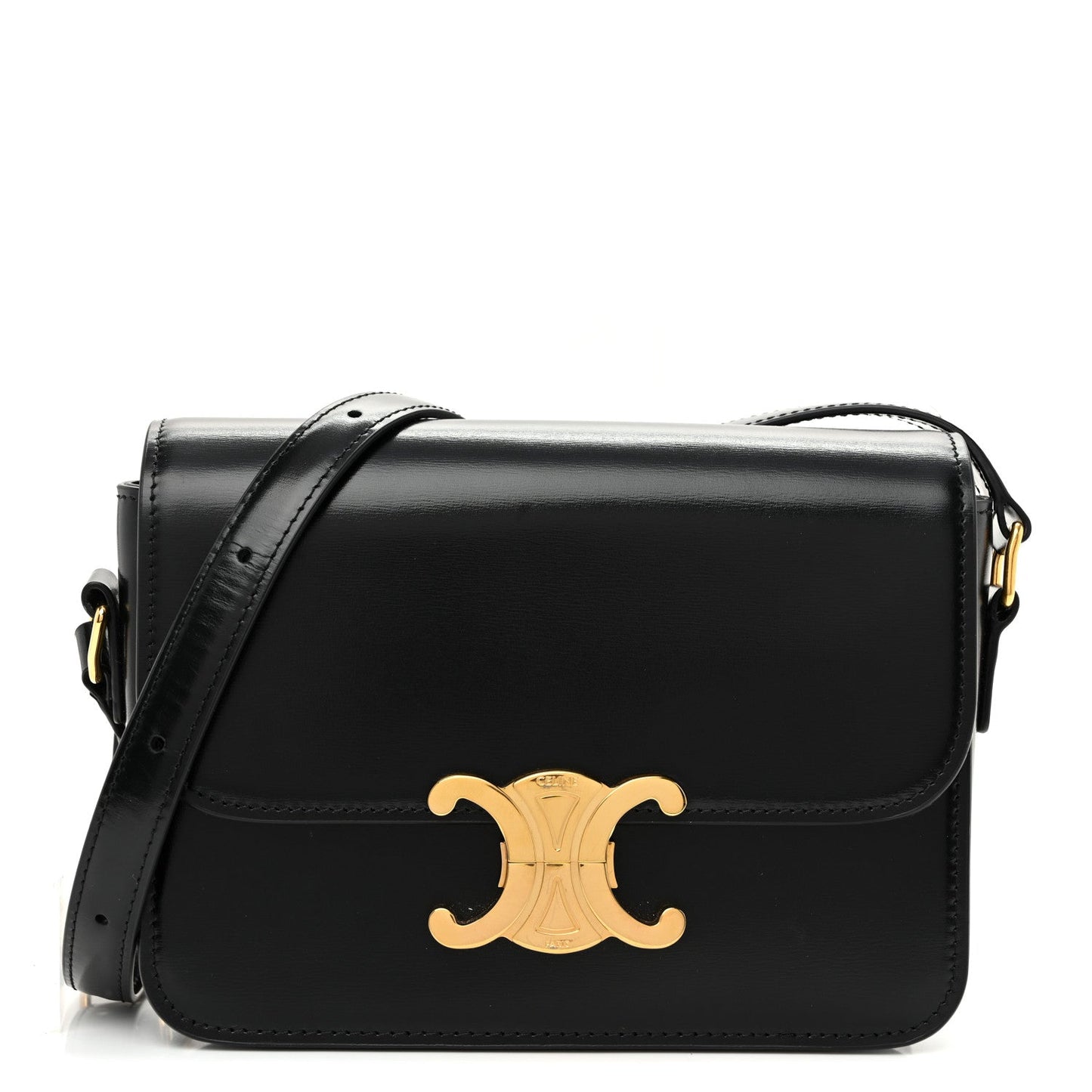 Black shiny calfskin shoulder bag with gold logo and top flap, adjustable strap.