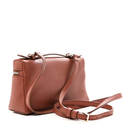 Grained calfskin pouch with top zip, leather handle, and adjustable crossbody strap