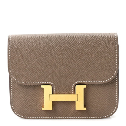 Hermes Constance slim wallet in etoupe textured leather with gold H clasp