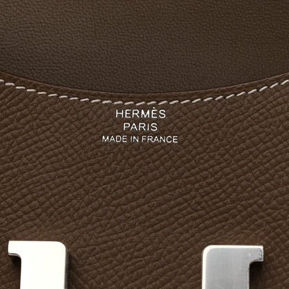 Hermes taupe wallet with 'HERMES PARIS MADE IN FRANCE' stamp