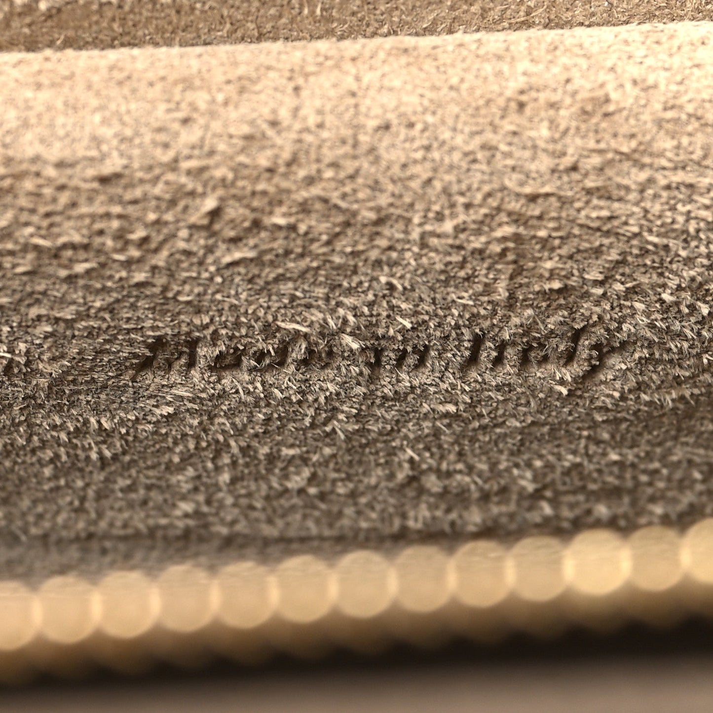 Celine micro belt bag leather close-up showing textured finish and edge trim