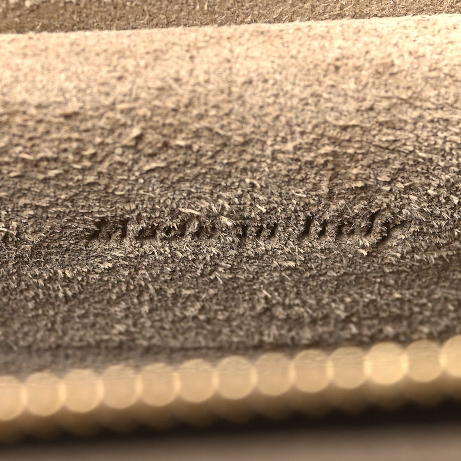 Celine micro belt bag leather close-up showing textured finish and edge trim