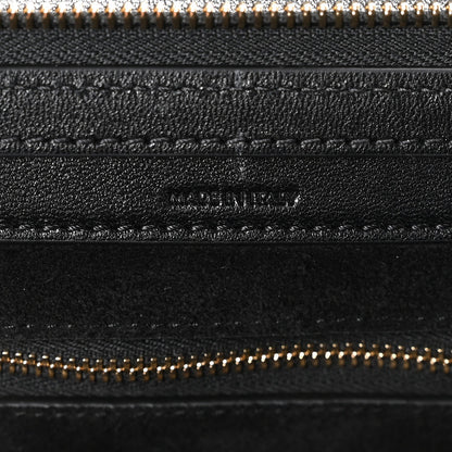 Celine black leather zip pocket close-up with gold-tone zipper teeth