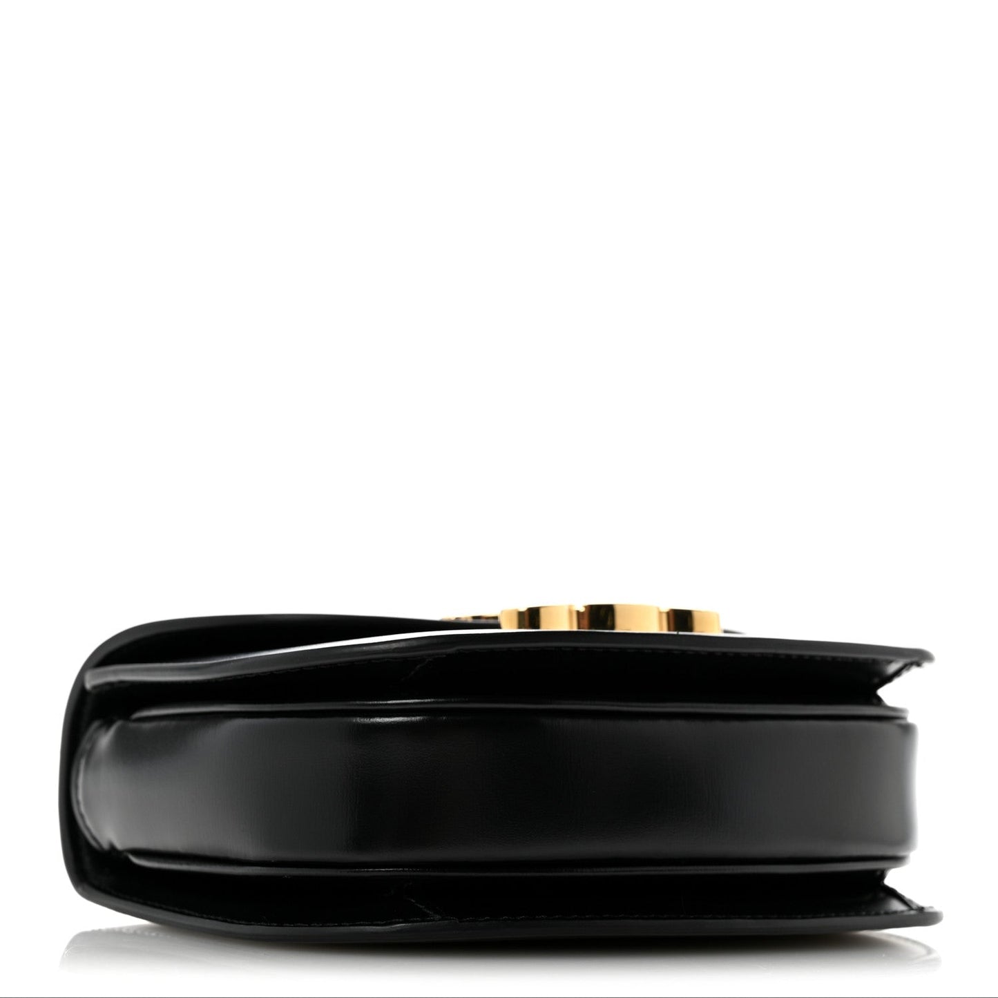 Black mini crossbody bag, side view with smooth leather and gold-tone edge detail