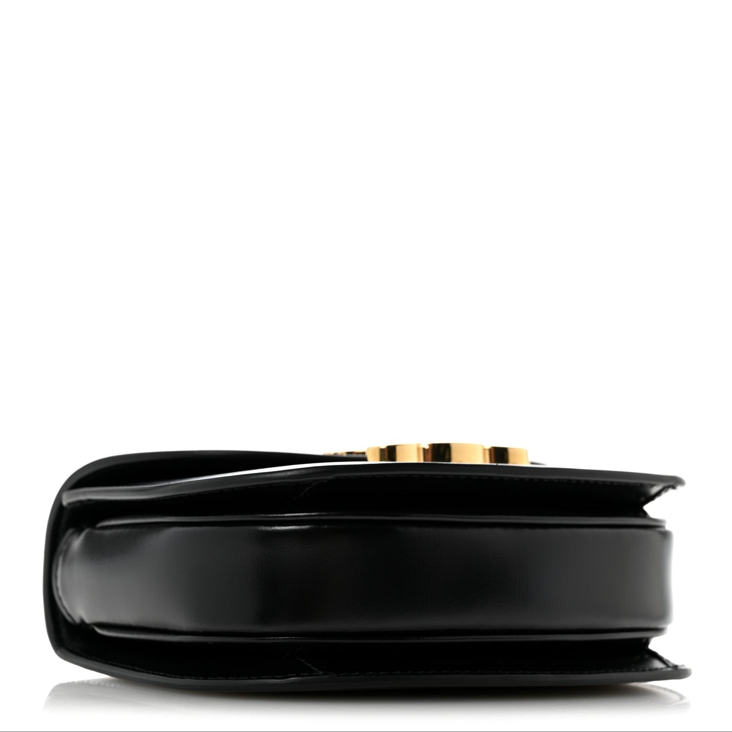 Black mini crossbody bag, side view with smooth leather and gold-tone edge detail