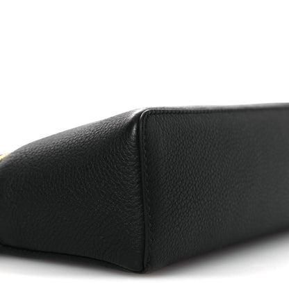 Black grained leather pouch corner with stitched edge and smooth side panel