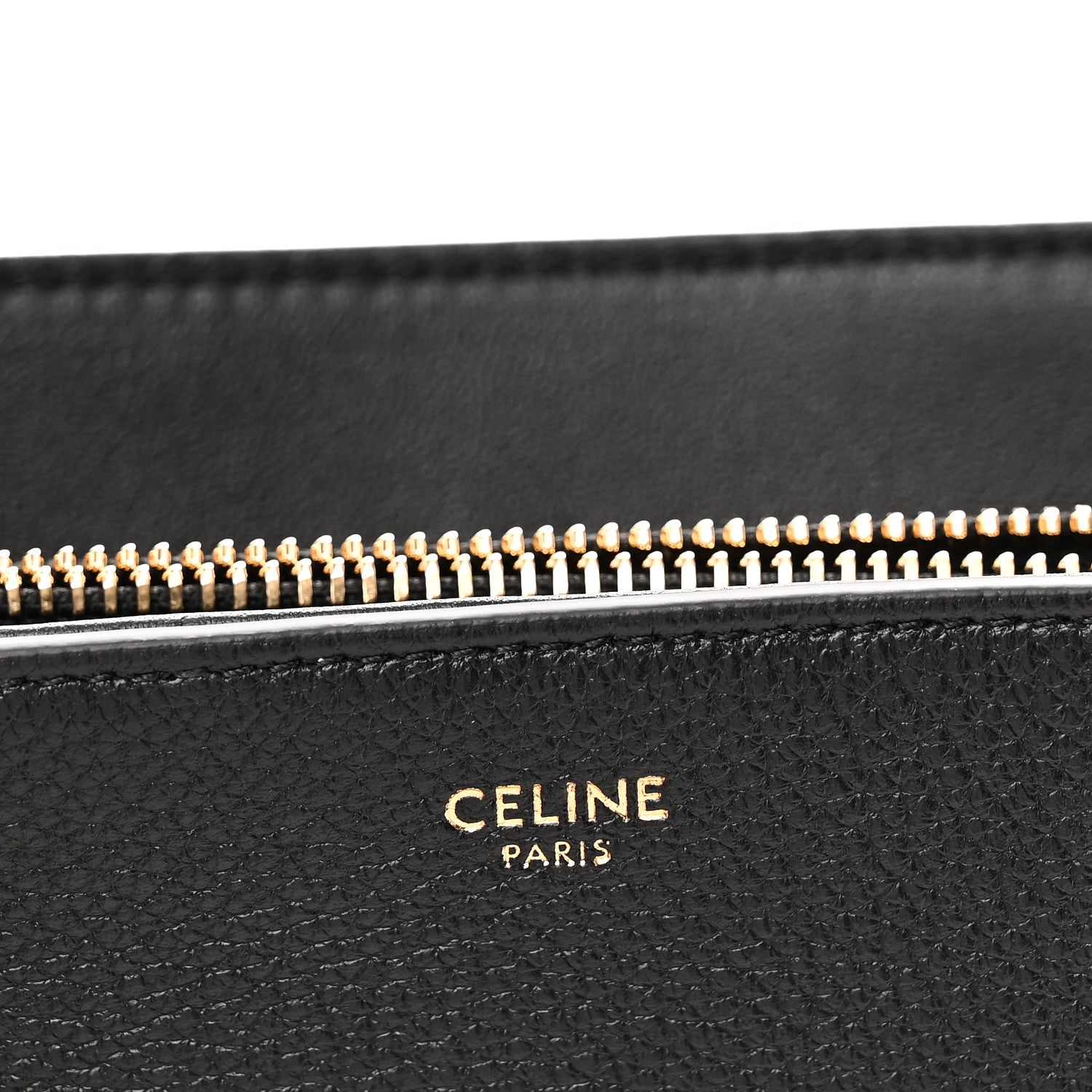 Black leather zipper lining with CELINE PARIS logo lettering