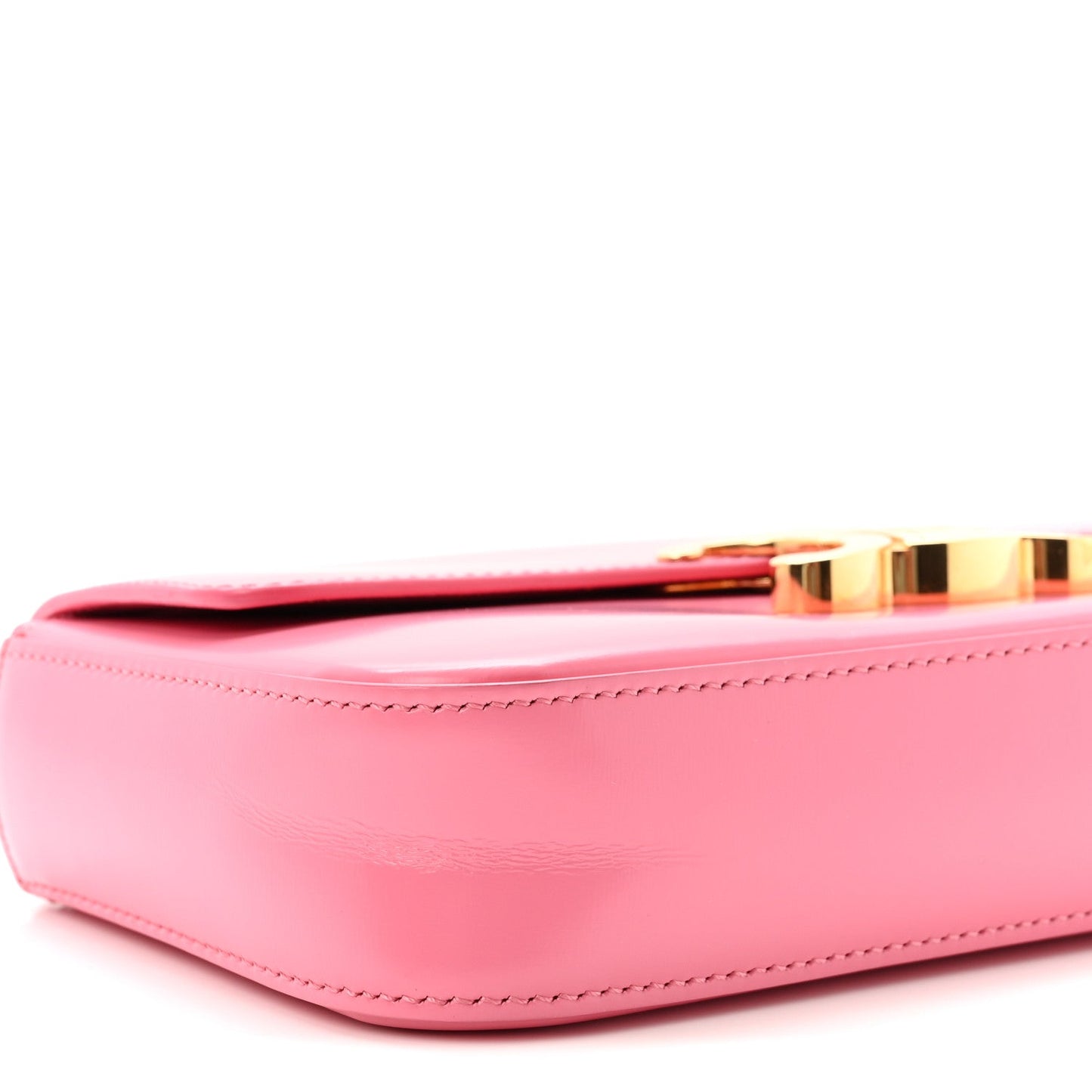 Flamingo pink leather shoulder bag with gold clasp bar and inner opening