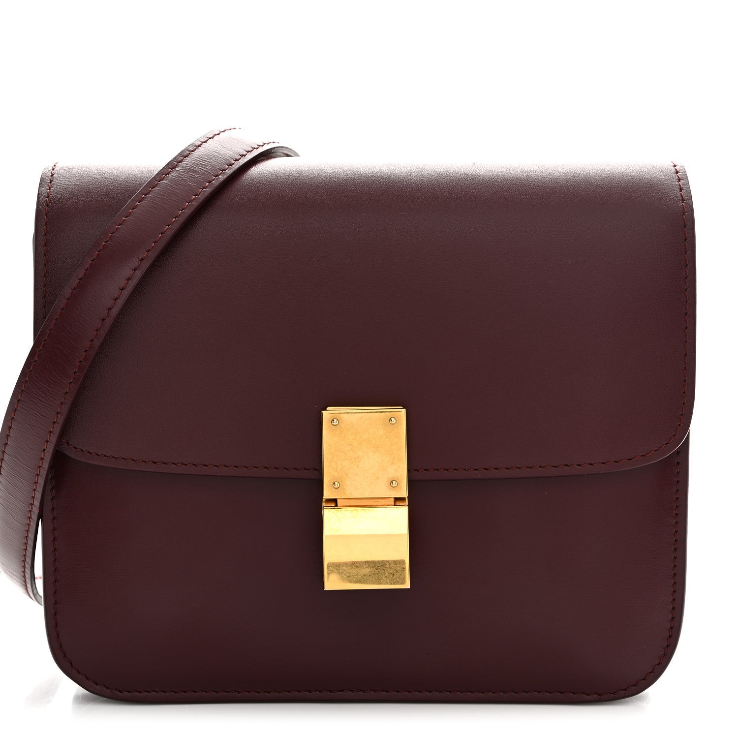 Burgundy leather box flap bag with gold-tone front clasp and top handle strap.