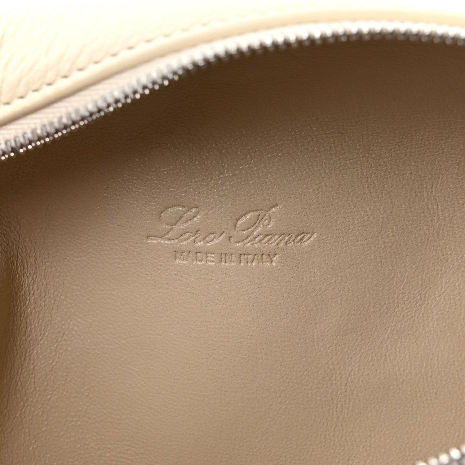Loro Piana calfskin pouch interior with debossed 'Loro Piana' mark and zipper trim