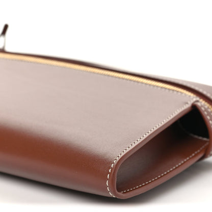 Loro Piana smooth calfskin clutch end view with brown leather edge trim