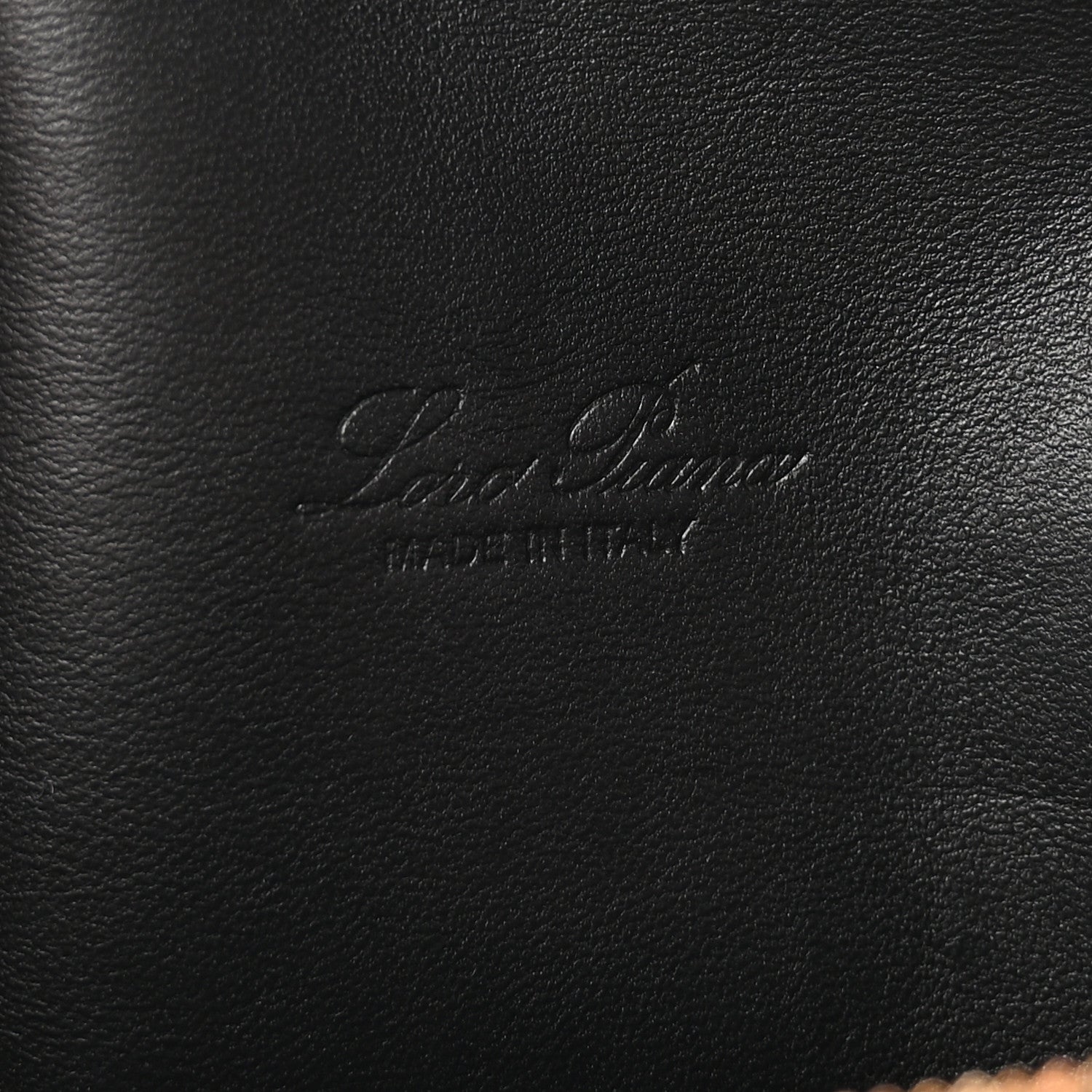 Loro Piana embossed logo on black grained calfskin pouch