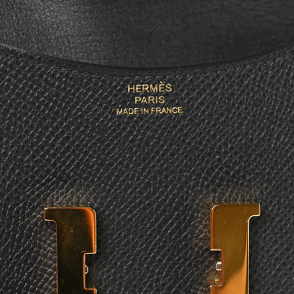 Hermès Constance Slim Wallet in black Epsom leather with gold-tone logo