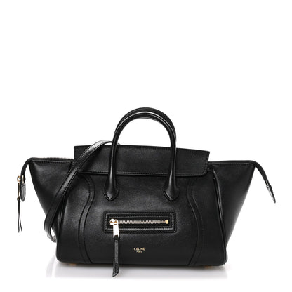 Celine black leather mini tote with top handles and front zip pocket detail
