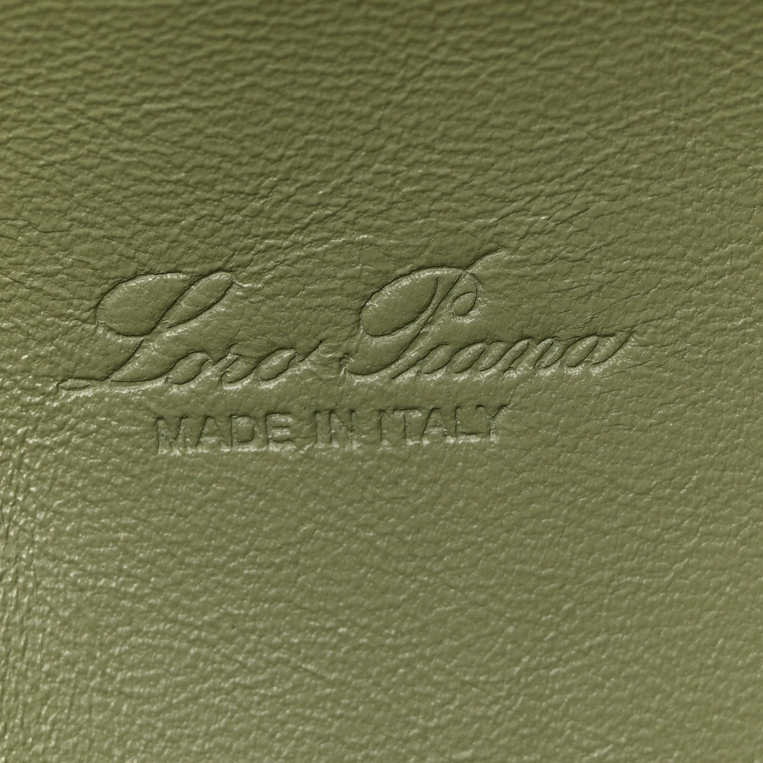 Embossed Loro Piana logo on sage green grained calfskin lining