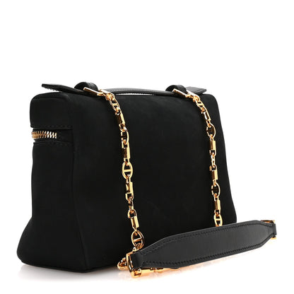 Black nubuck pouch with front zip pocket and gold chain strap