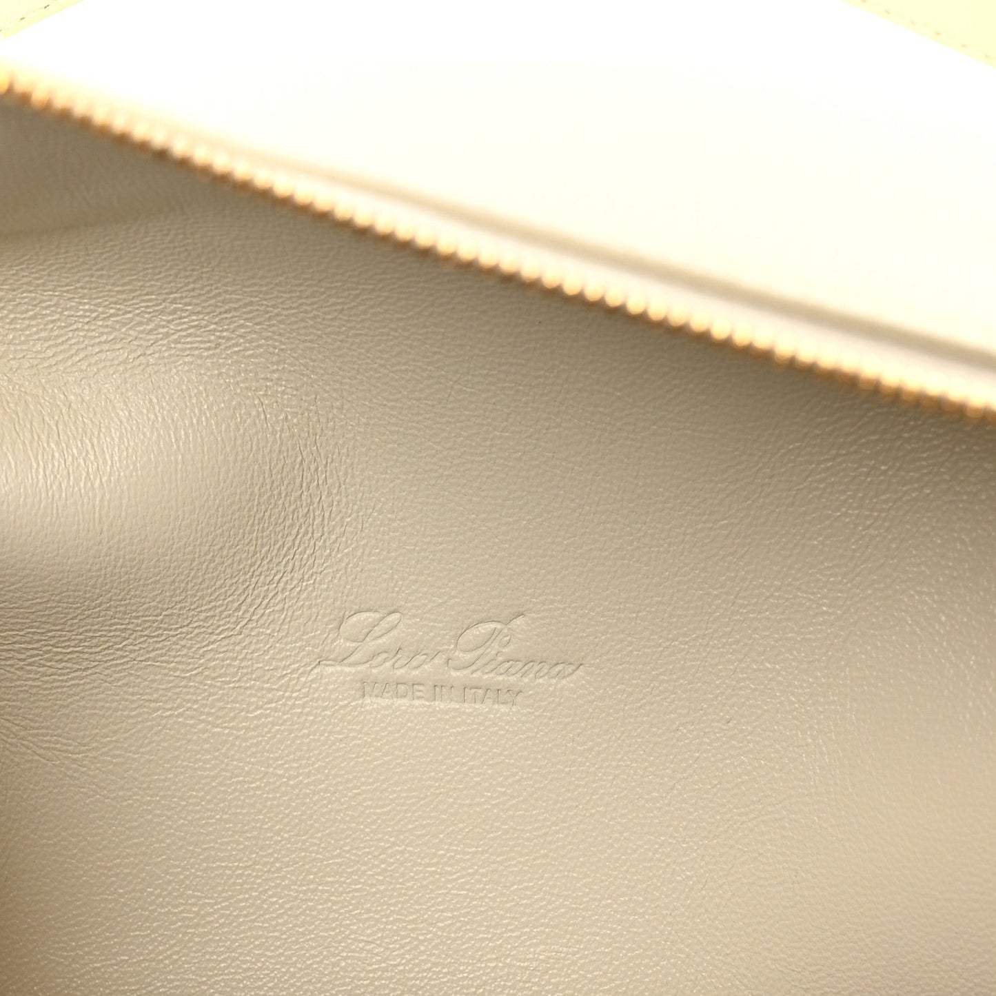 Loro Piana grained calfskin pouch interior lining with stitched brand imprint