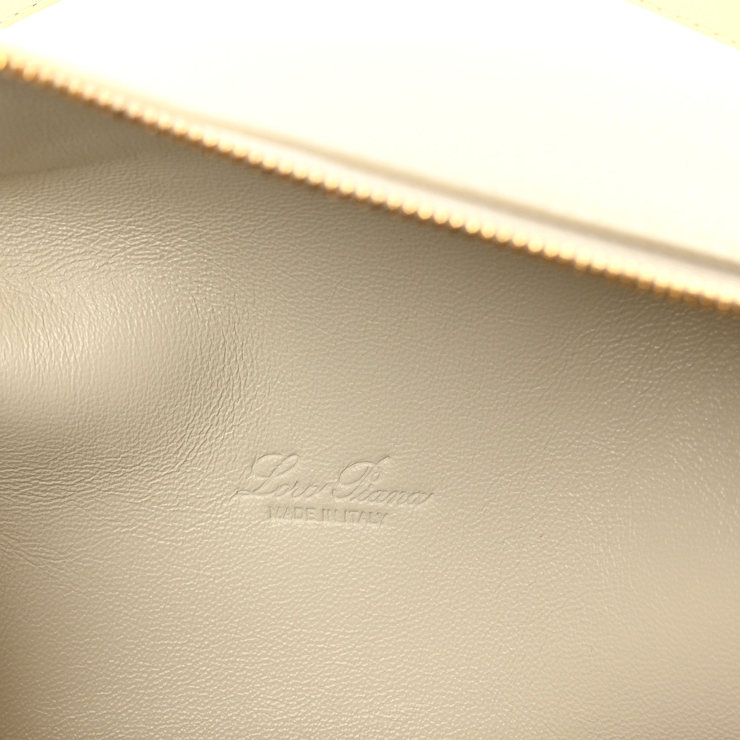 Loro Piana grained calfskin pouch interior lining with stitched brand imprint