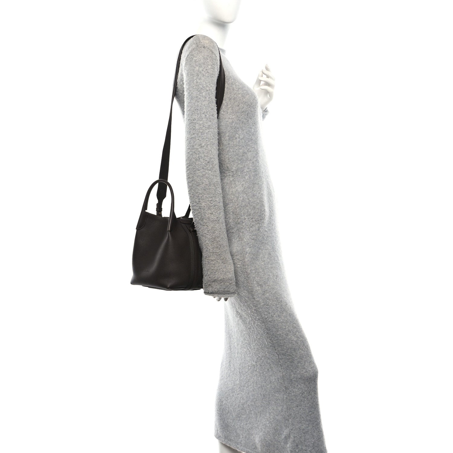 Dark brown grained calfskin small bale bag, side view with top handles and strap