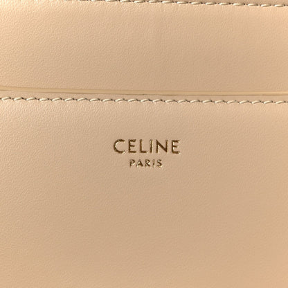 Celine Paris logo stamped on beige leather panel with stitching
