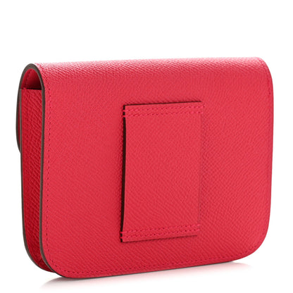 Hermes slim wallet in rose red textured leather, back panel view
