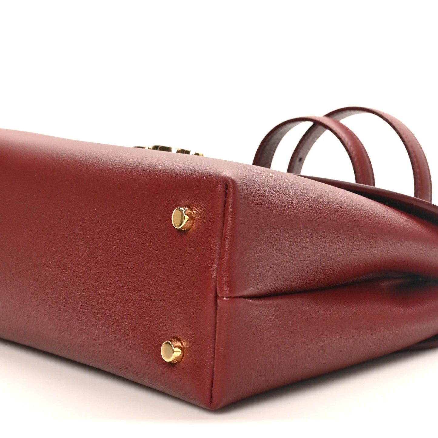 Celine burgundy grained leather bag side with gold studs and top handle
