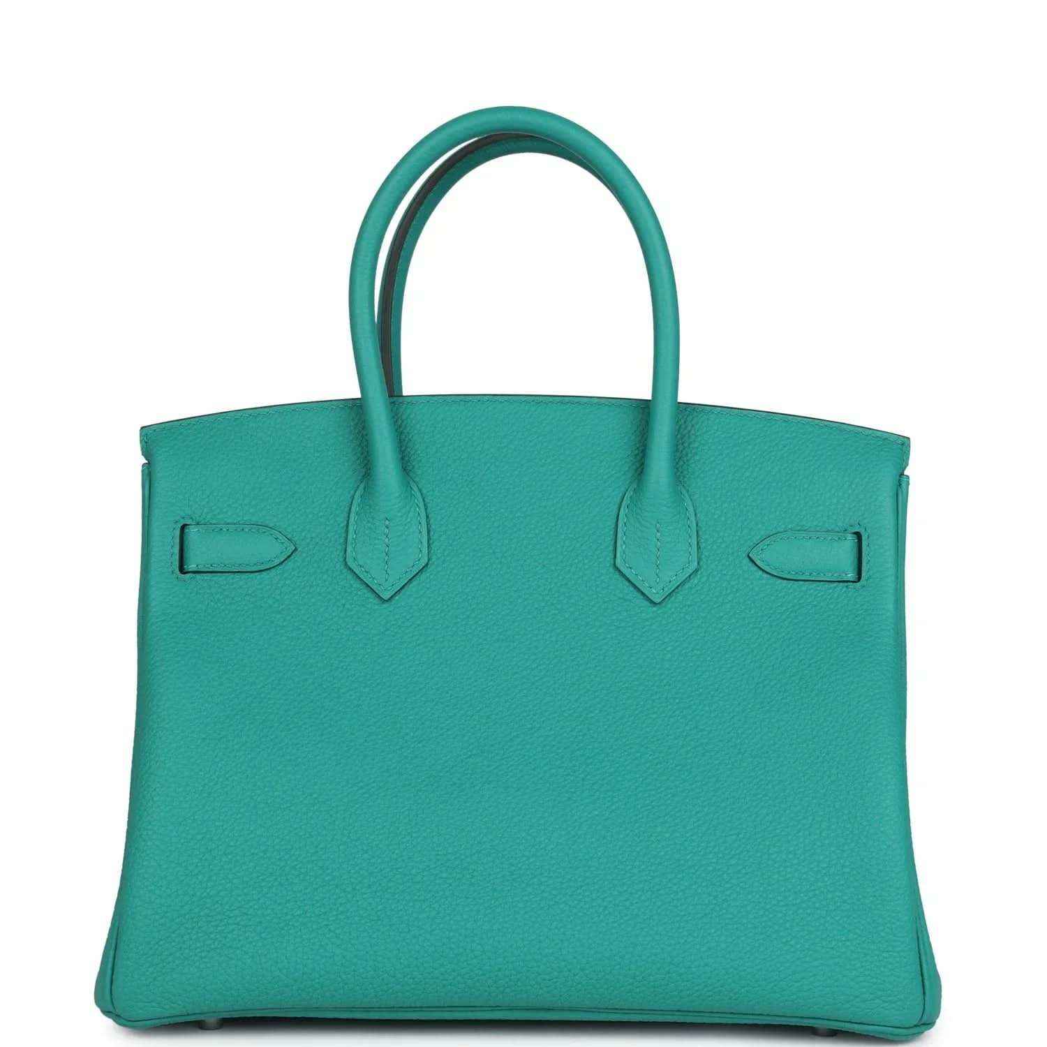 Elegant turquoise leather handbag with double handles and timeless, sophisticated style