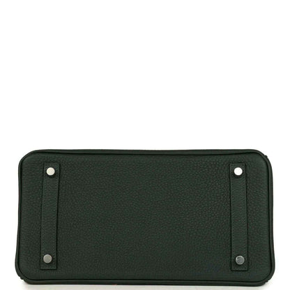 Timeless dark green leather handbag base with elegant textured finish and metal feet.