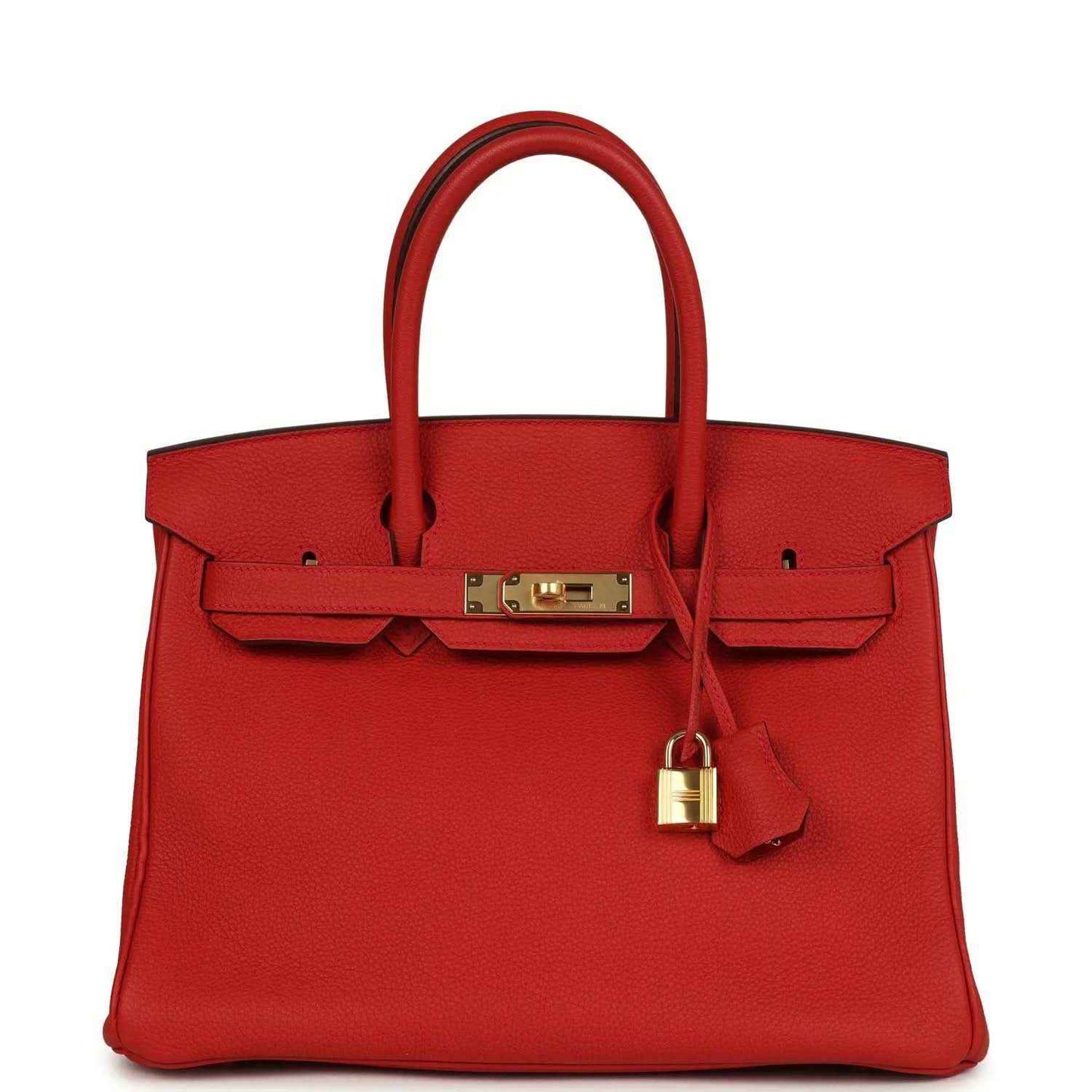Timeless, elegant red leather handbag with gold hardware and sophisticated detailing.