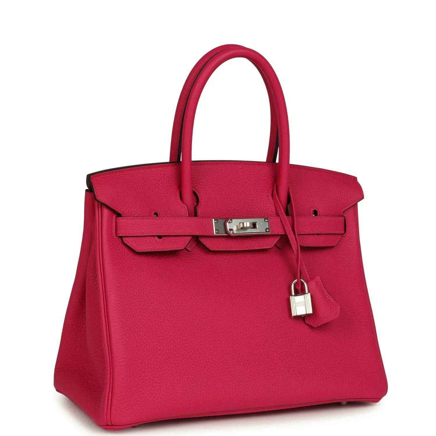 Timeless, elegant pink leather handbag with silver hardware and structured silhouette