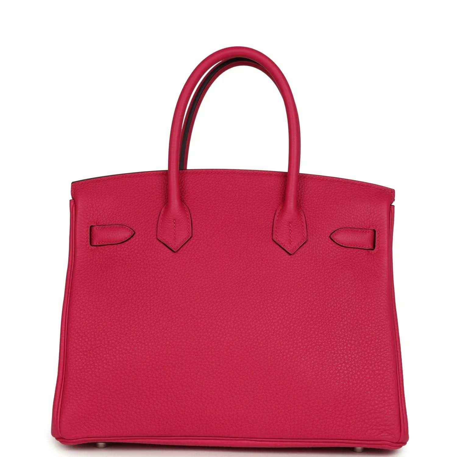 Elegant hot pink leather tote bag with timeless, sophisticated design and refined finish.