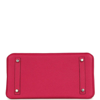 Timeless, sophisticated pink leather handbag base with elegant textured finish and silver studs.