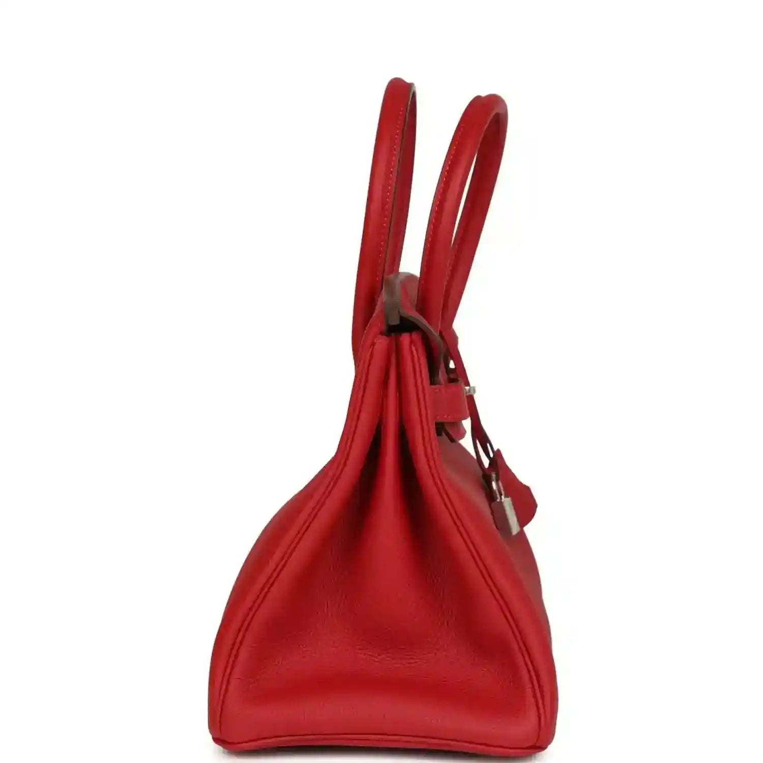 Elegant red leather handbag with a timeless, sophisticated side profile.